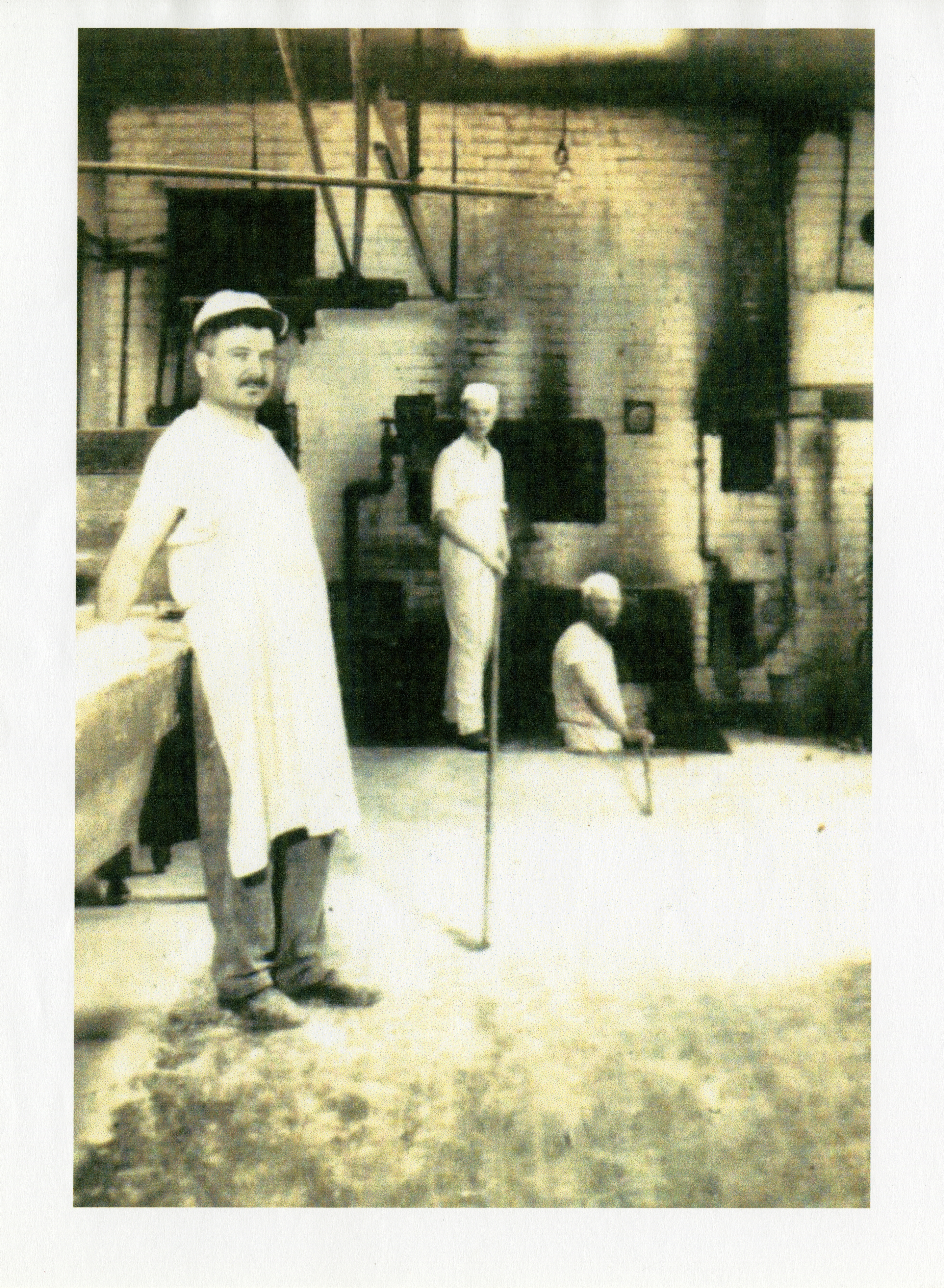 Sam Gryfe (left), Art Gryfe and bakery employee, 319 Augusta Ave., (Toronto, ON), ca.  1936.