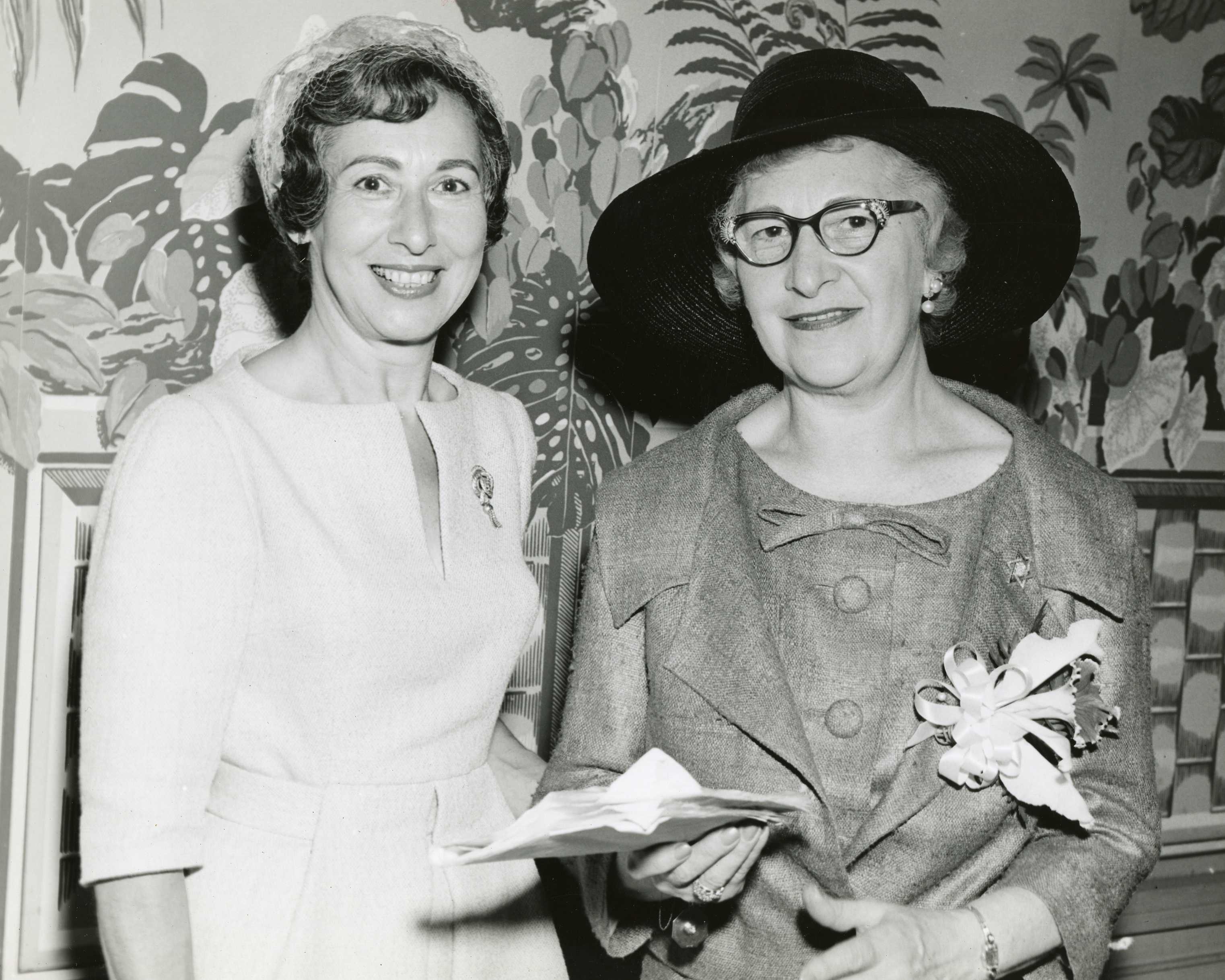 Incoming President Lillian Soles with Dora Till at the Women's Auxiliary's closing meeting, 1959. Ontario Jewish Archives, fonds 14, series 4-2, file 8, item 1.