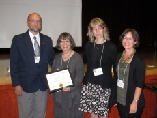 Pictured in photograph (left to right): Dr. Brad Rudachyk (President, OHS), Cyrel Troster (OJA Board Member), Dr. Ellen Scheinberg (Former Director, OJA)  and Dr. Sharon Jaeger (Chair, Honours and Awards Committee, OHS).
