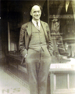 R.J. Hoffman in front of his store, ca. 1935