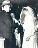 Rabbi Chaim Meyer Zimmerman officiating at the wedding of Ethel Gary and Jack Halter at the Apter Synagogue, 216 Beverley St., Toronto , c. 1948.