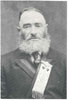Mordechai Chaim Scheinkman wearing badge of Mozirer Sick Benefit Society, ca. 1915. 
